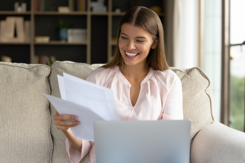 woman reviewing loan docs